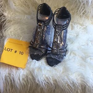 Size 6 1/2 strapped heels in silver black